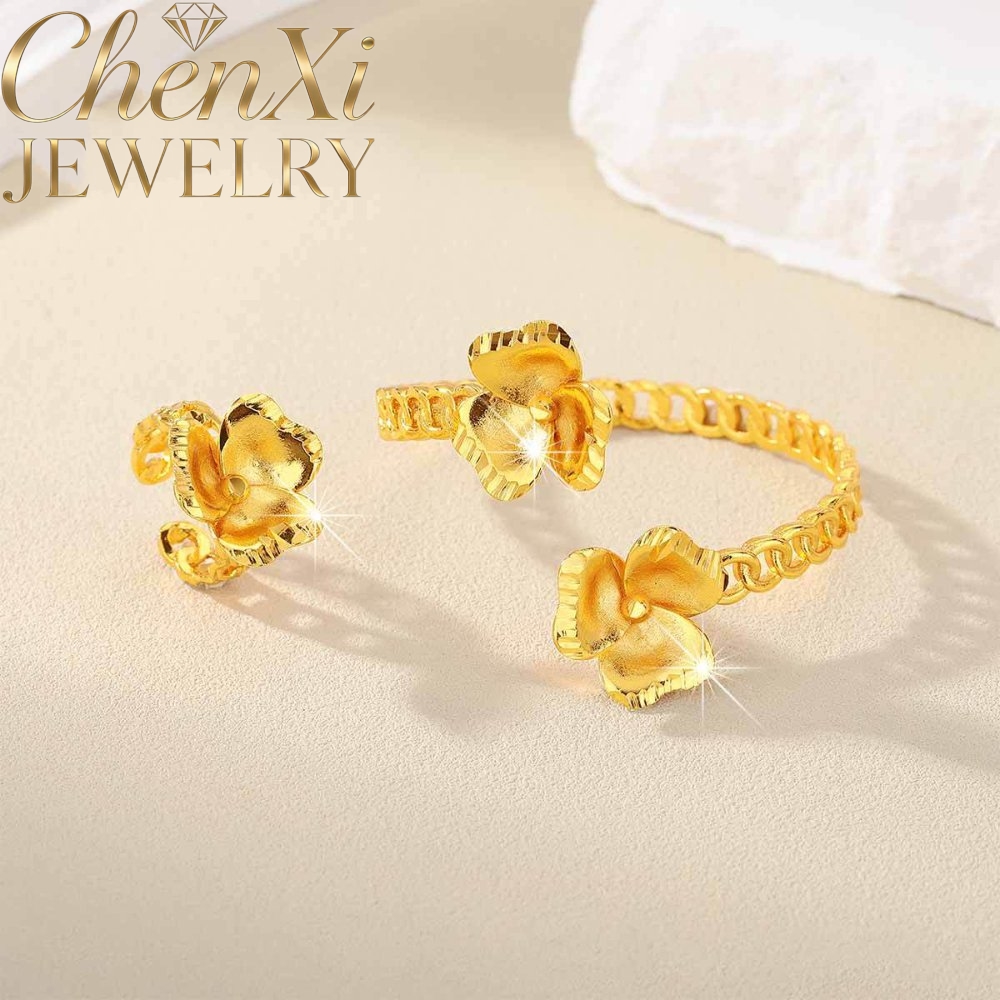 Zandgouden bloemmotief open ar - Coordinates Bracelet recensie en prijs